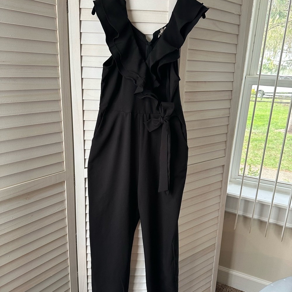 Main Strip Black Ruffle V-Neck Jumpsuit with Waist Tie and Pockets